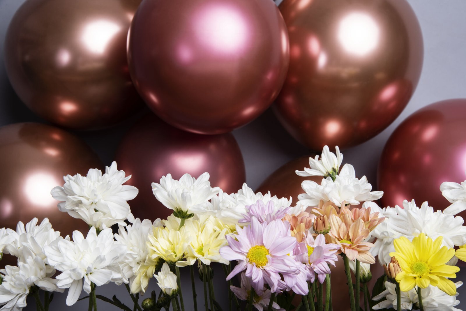 Luxury balloon and floral styling for a birthday celebration